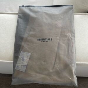 Essentials TEE brand new with tags